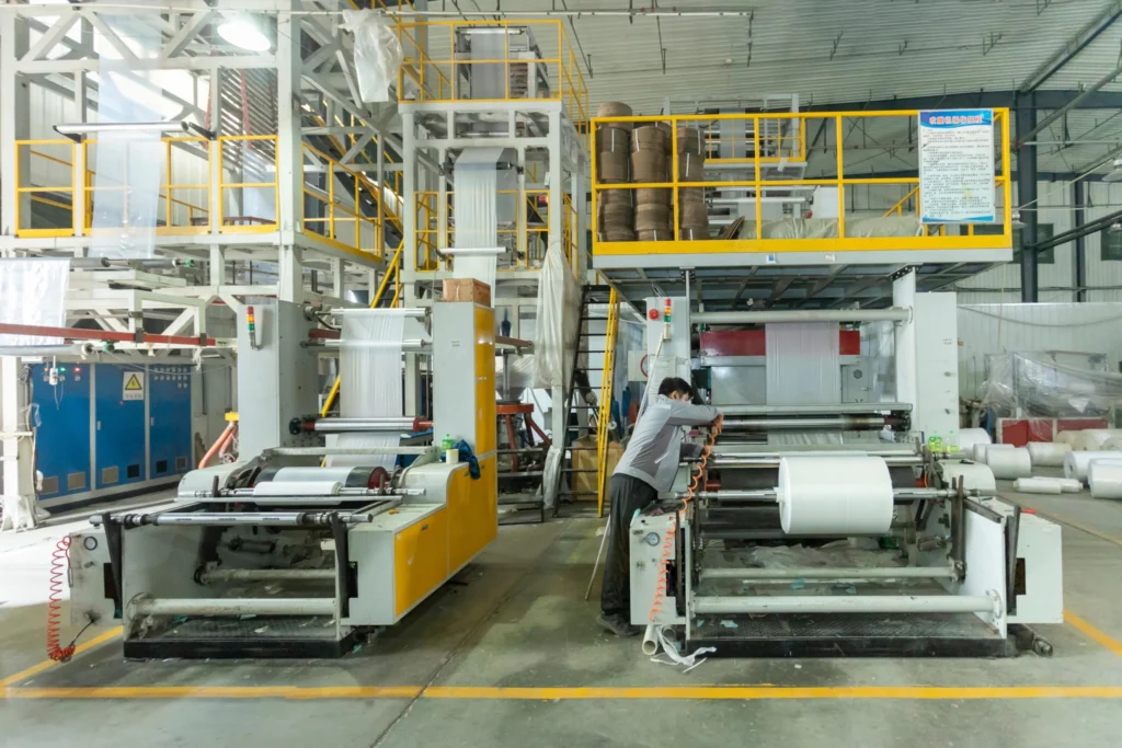 FIBC bulk bag manufacturing facility with advanced production equipment and skilled workers ensuring high-quality industrial packaging solutions.